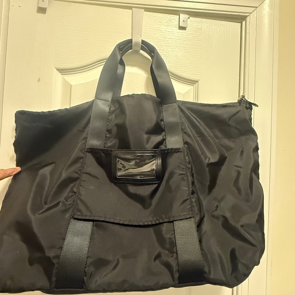 Tumi Black Travel Bag can attach to the suitcase or luggage - Picture 10 of 16